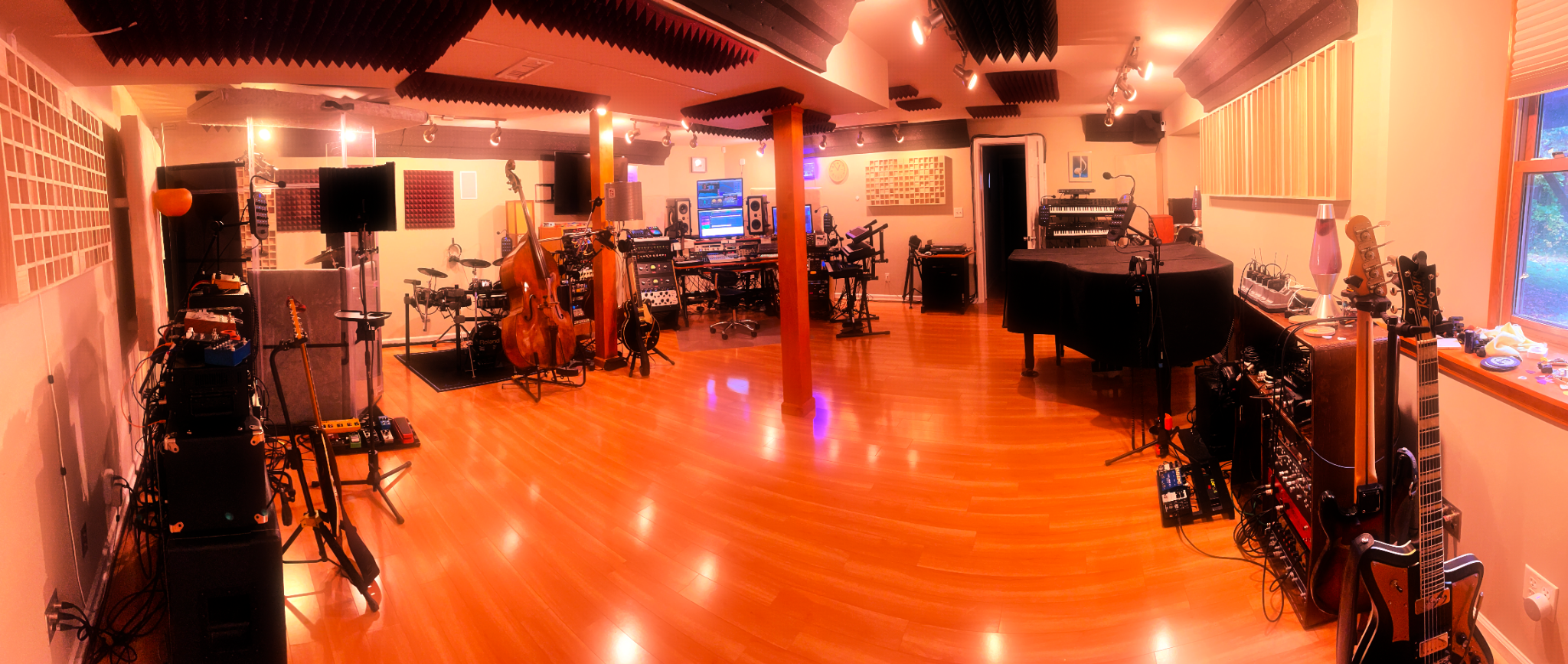 Recording studio filled with instruments and audio equipment